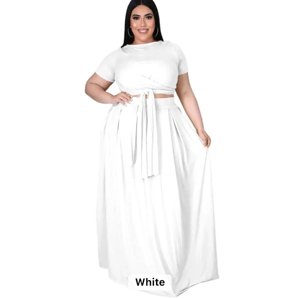 2 piece set includes top which cross ties and long skirt